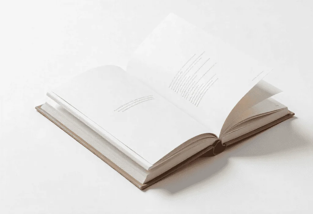 Custom hardcover book with professional binding and printed pages, displayed on a white background